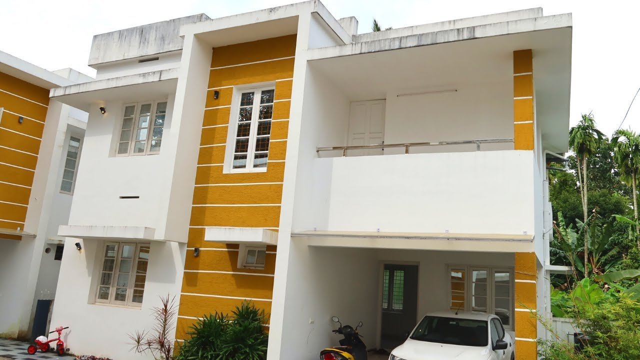 1200 Sq Ft 3BHK Contemporary Flat Roof Modern Two-Storey House at 3.5 Cent Plot