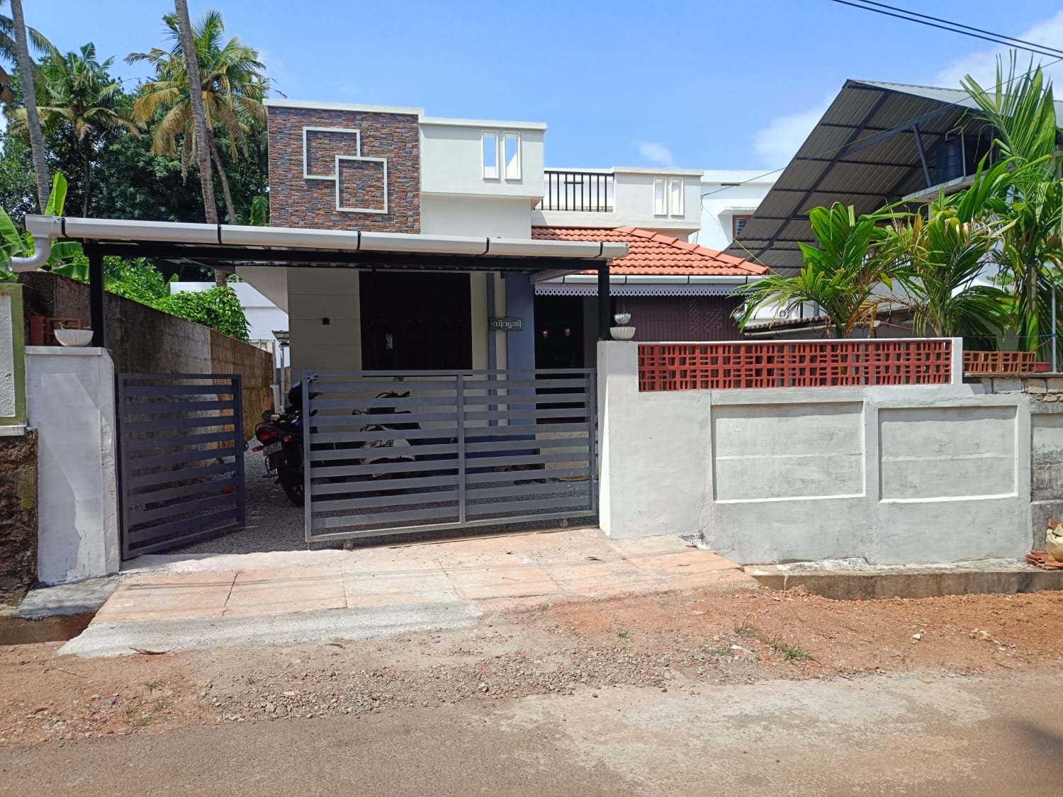 compact 2 bhk house elevation at Thrissur